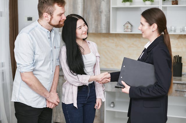 wo%20people%20shaking%20hands%20with%20a%20landlord